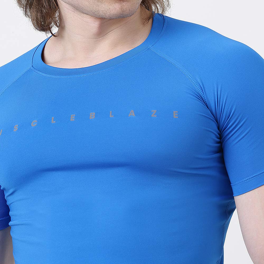 5 - MuscleBlaze Compression Muscle Tee Half Sleeve,  Large  Superman Blue