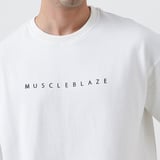 https://img4.hkrtcdn.com/43545/prd_4354463-MuscleBlaze-Natty-But-Tasty-Oversized-Solid-TShirt-Large-White_o.jpg
