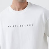 9 - MuscleBlaze Natty But Tasty Oversized Solid T-Shirt, X-Small White